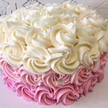 Bs Bakery white and pink iced cake