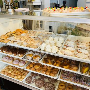 B's Bakery display case full of doughnuts and other baked goods