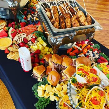 A table full of food for catering at an event.