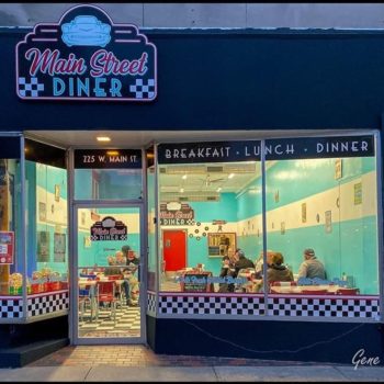 Main Street Diner exterior shot, showing people eating inside