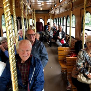 Inside of Trolley with smiling people