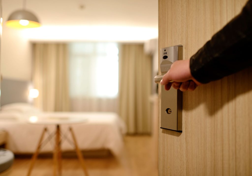 hotel door opening up to clean room